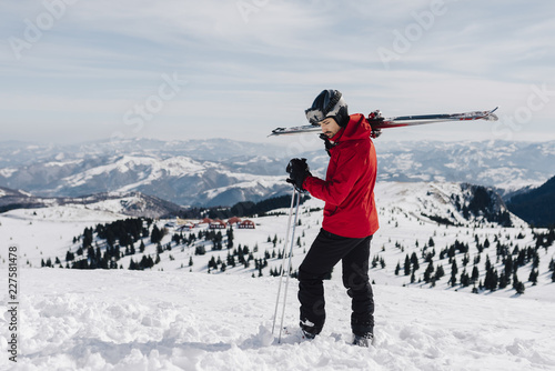 Young Man freerider Walking on the Mountain photo