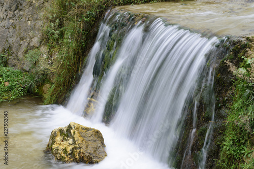 Fototapeta Naklejka Na Ścianę i Meble -  Waterfall in the forest in Austria near Heiligenblut am Großglockner