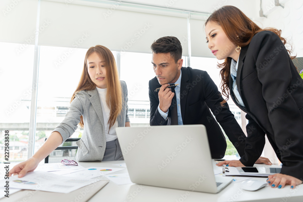Young Business People are discussing and brainstorming together. Young Business People are discussing and brainstorming together.
