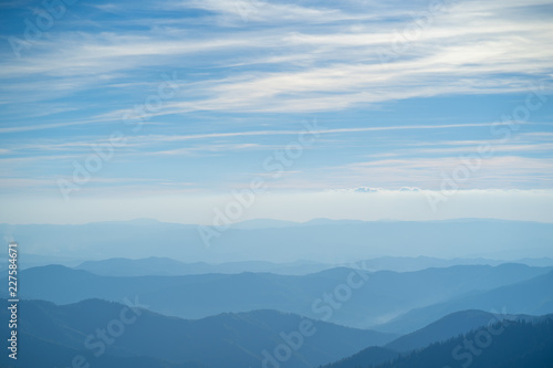 The picturesque foggy mountain landscape © realstock1