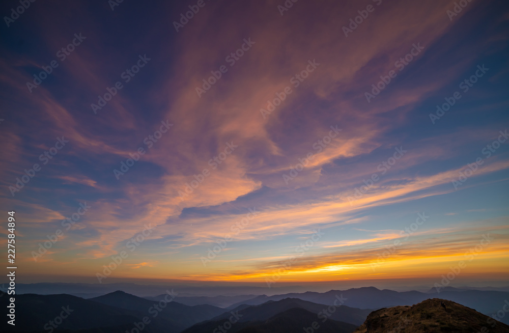 The picturesque sunset above mountains