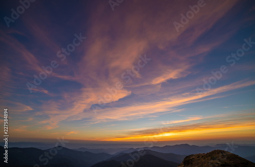 The picturesque sunset above mountains © realstock1