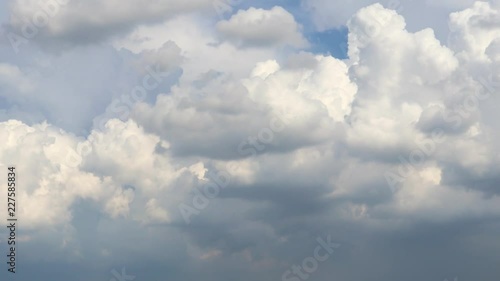 Dramatic atmosphere panorama 4K Time-lapse footage  clip of blue sky and storm clouds on tropical season.