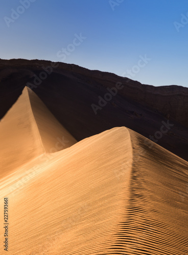 atacama desert, valle de marte, sand and sun landscape that look like mars photo