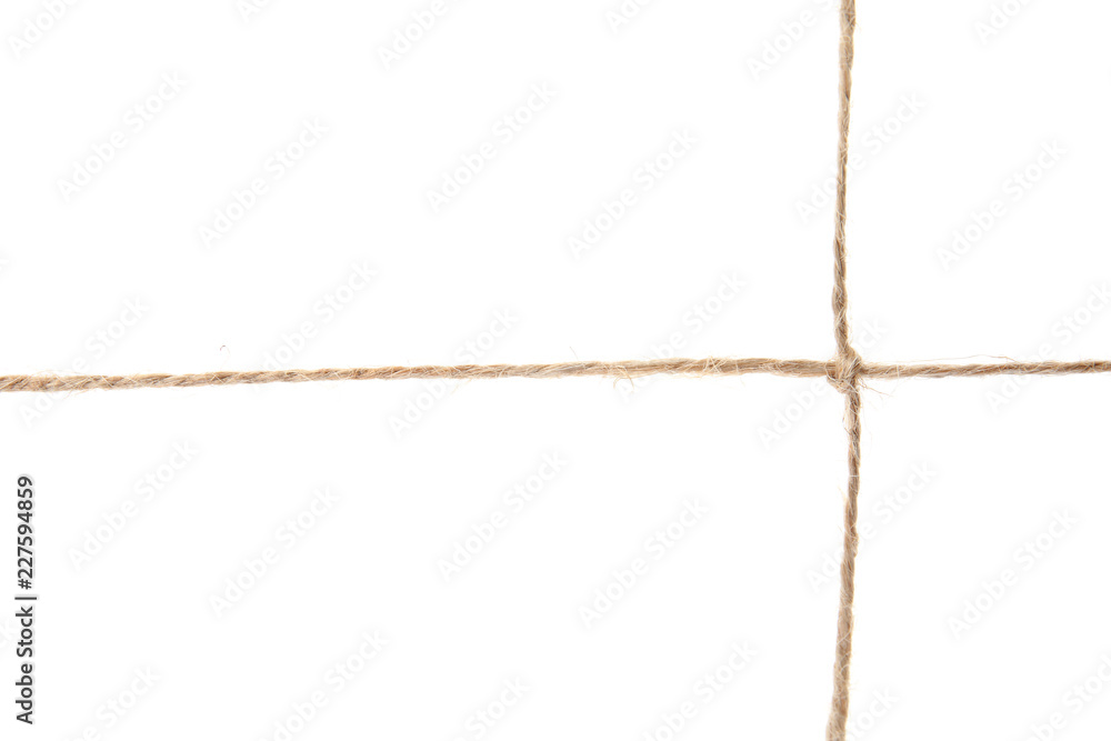 Hemp rope with knot on white background. Organic material Hemp rope with knot on white background. Organic material