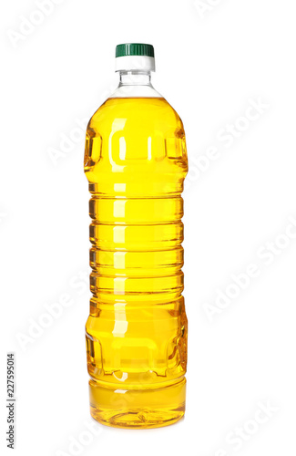 Fototapeta Naklejka Na Ścianę i Meble -  Plastic bottle of oil on white background