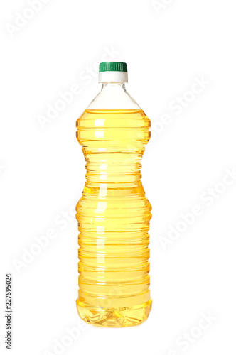 Fototapeta Naklejka Na Ścianę i Meble -  Plastic bottle of oil on white background