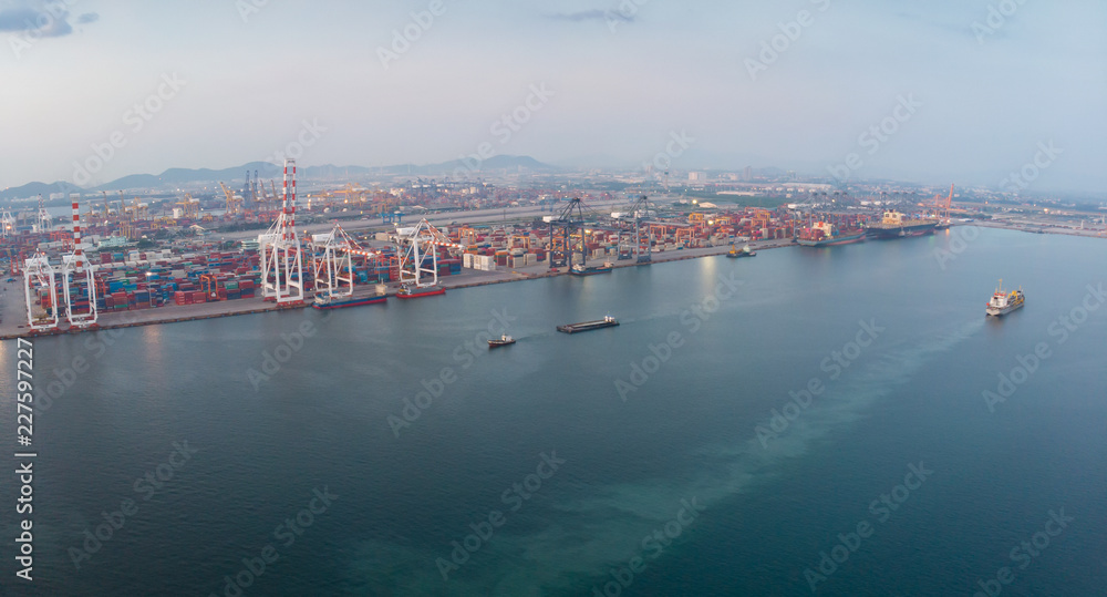 Aerail view of cargo container ship in the cargo international yard port .