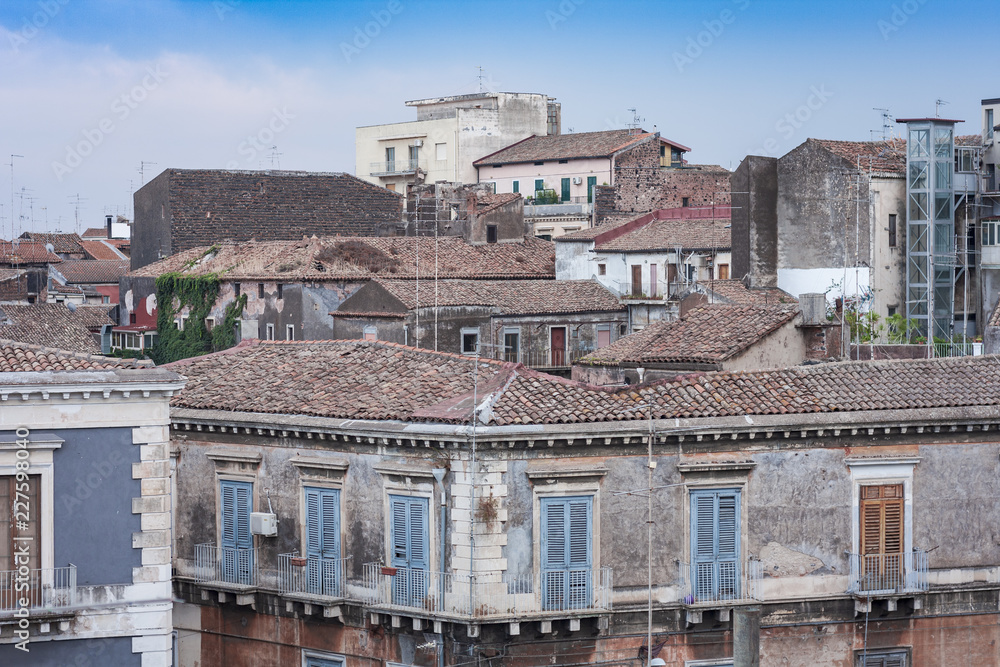 Catania rooftops and cityscape in the background, Sicily, Italy