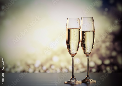 two champagne glasses ready to bring in the New Year