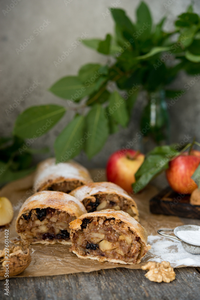 Apple classic strudel on a wooden table