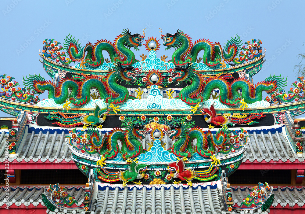 Green dragon on the roof of a Chinese temple.