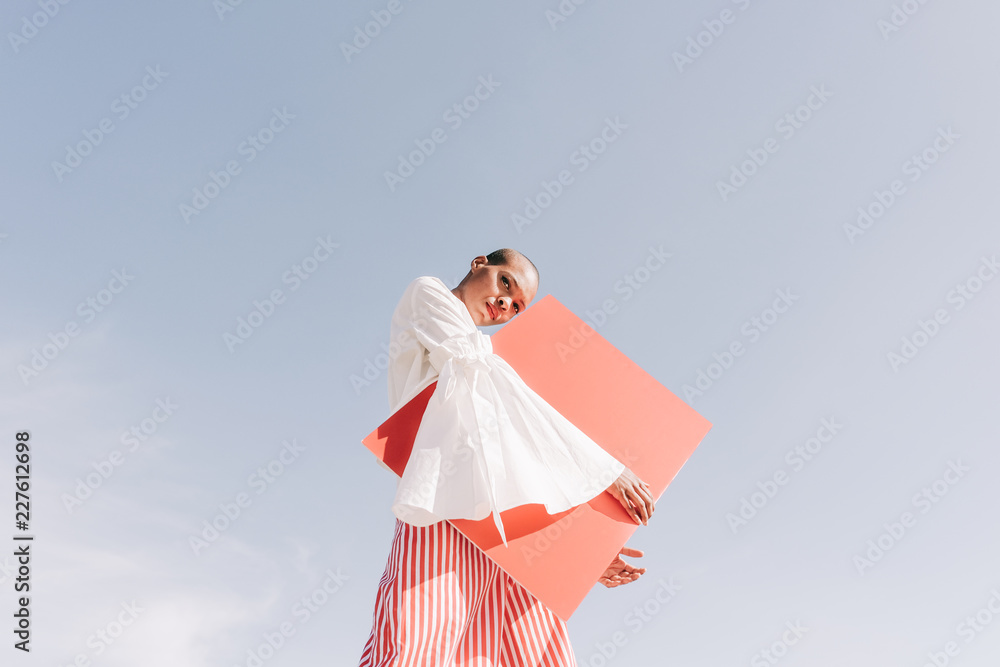 girl with red board girl with red board