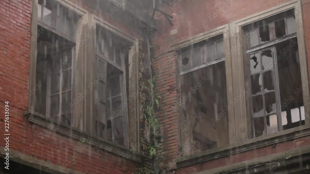 Desert abandoned factory under torrential rain. Desert abandoned factory under torrential rain.