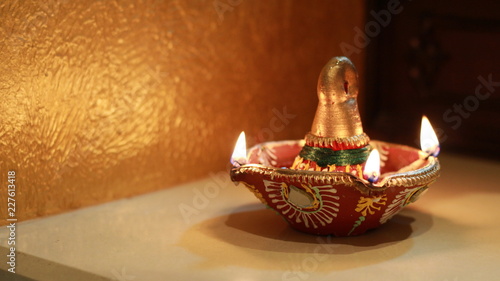 Fotografie Traditional Earthen Lamp lit up for Indian Festival of Diwali
