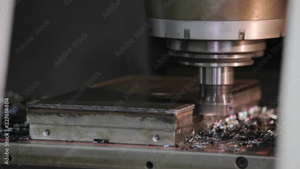 Drill is working to remove welding waste. Drill is working to remove welding waste.