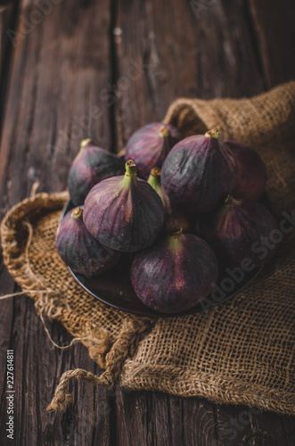Fresh figs on wood board