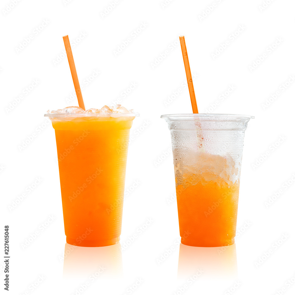 Orange juice in plastic glass isolated on white background. Healthy drink with sweet and sour taste. ( Clipping paths or cut out object for montage ) Orange juice in plastic glass isolated on white background. Healthy drink with sweet and sour taste. ( Clipping paths or cut out object for montage )