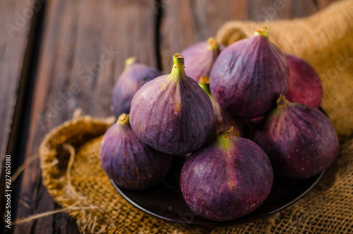 Fresh figs on wood board