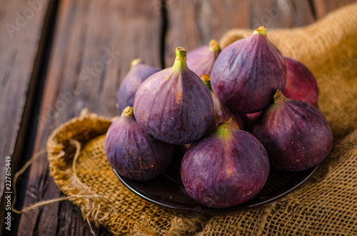 Fresh figs on wood board
