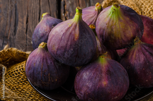 Fresh figs on wood board