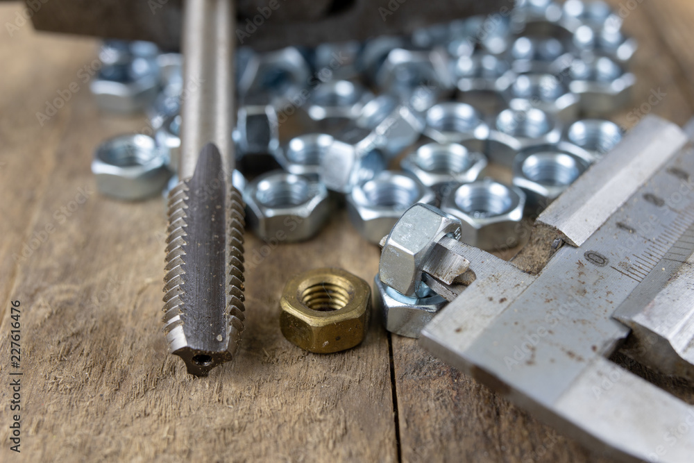 Dies and tap for thread cutting in locksmith works. Accessories for a mechanic. Dies and tap for thread cutting in locksmith works. Accessories for a mechanic.