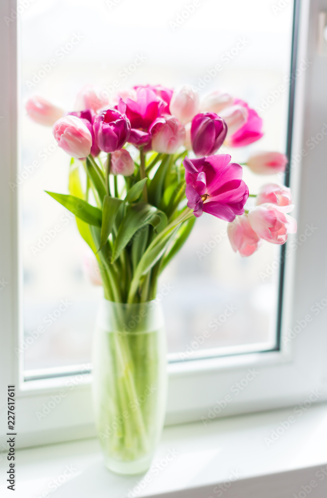 A bouquet of tulips in a vase. Soft selective focus A bouquet of tulips in a vase. Soft selective focus