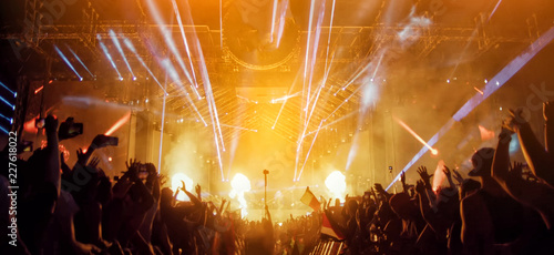 Konstfotografi Crowd at concert and blurred stage lights with fireworks