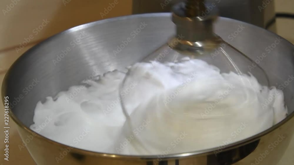 kitchen mixer whisk dough made from egg yolk and flour. kitchen mixer whisk dough made from egg yolk and flour.