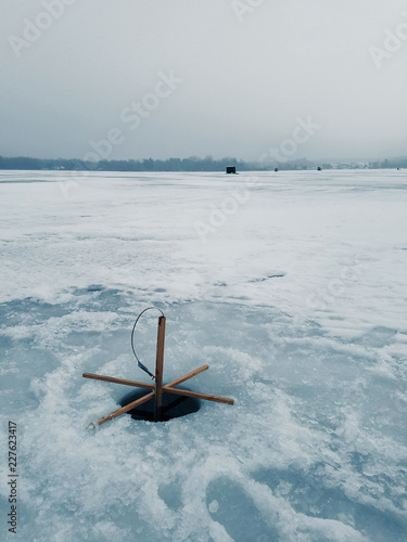 Ice Fishing Tip-Up on Frozen Lake