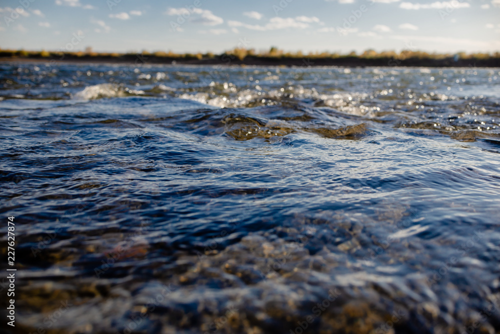 Quiet river water in the evening light background Quiet river water in the evening light background