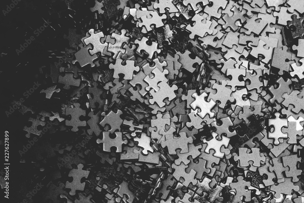 Selective focus of pieces puzzle jigsaw, puzzle background. Jigsaw puzzle color background. Selective focus of pieces puzzle jigsaw, puzzle background. Jigsaw puzzle color background.