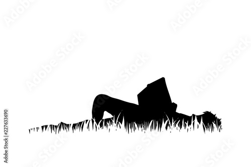 Vector silhouette of boy read book in the grass on white background.