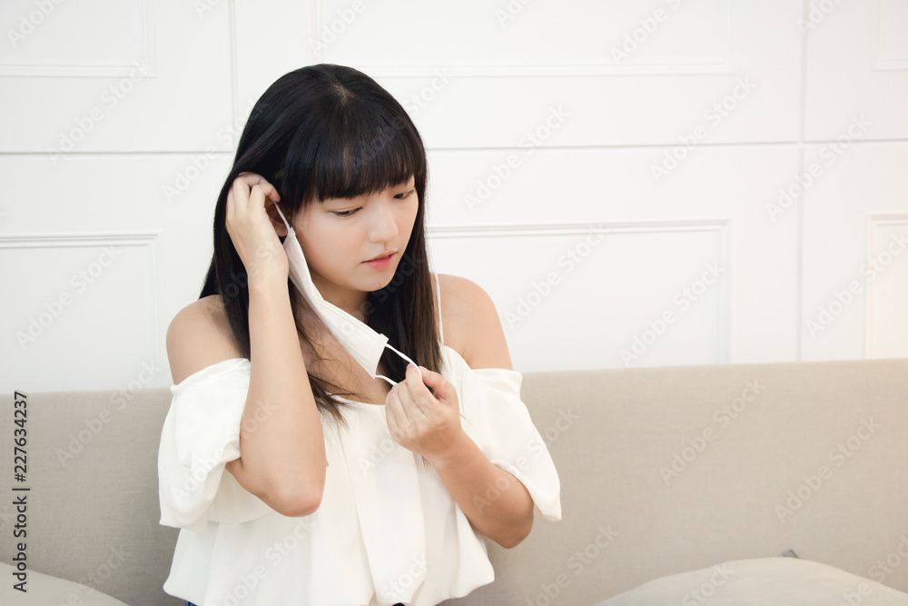 Woman suffer from cough with face mask protection. Woman suffer from cough with face mask protection.