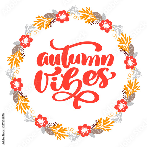 Autumn Vibes calligraphy lettering text in frame of branch leaves and flowers. 