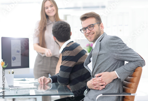 businessman sitting at his Desk in the office