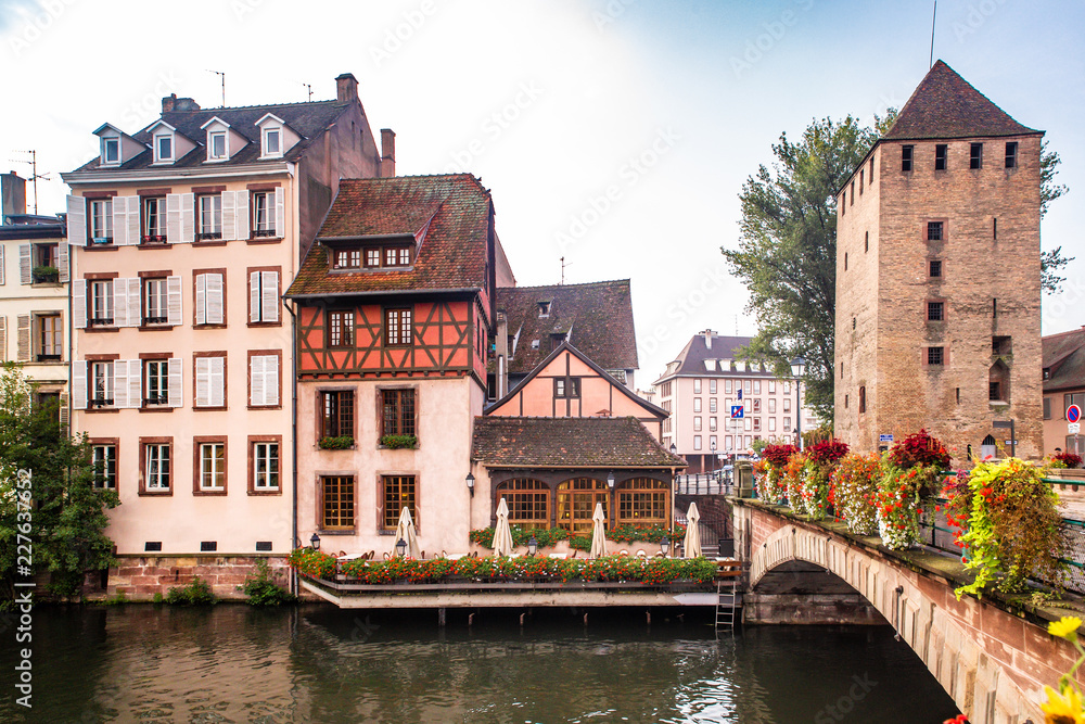 View of beautiful half-timbered houses and canal seen from Strasbourg France