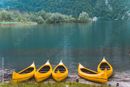Canoes on mountain lake