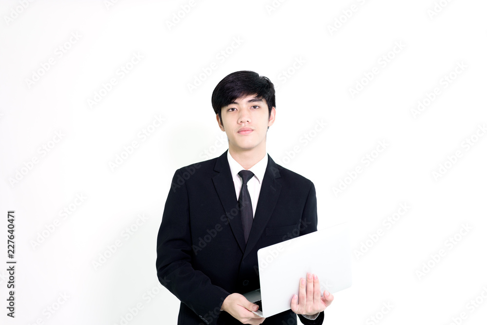 Asian business handsome man has holding laptop for woking isolated on white background. Asian business handsome man has holding laptop for woking isolated on white background.