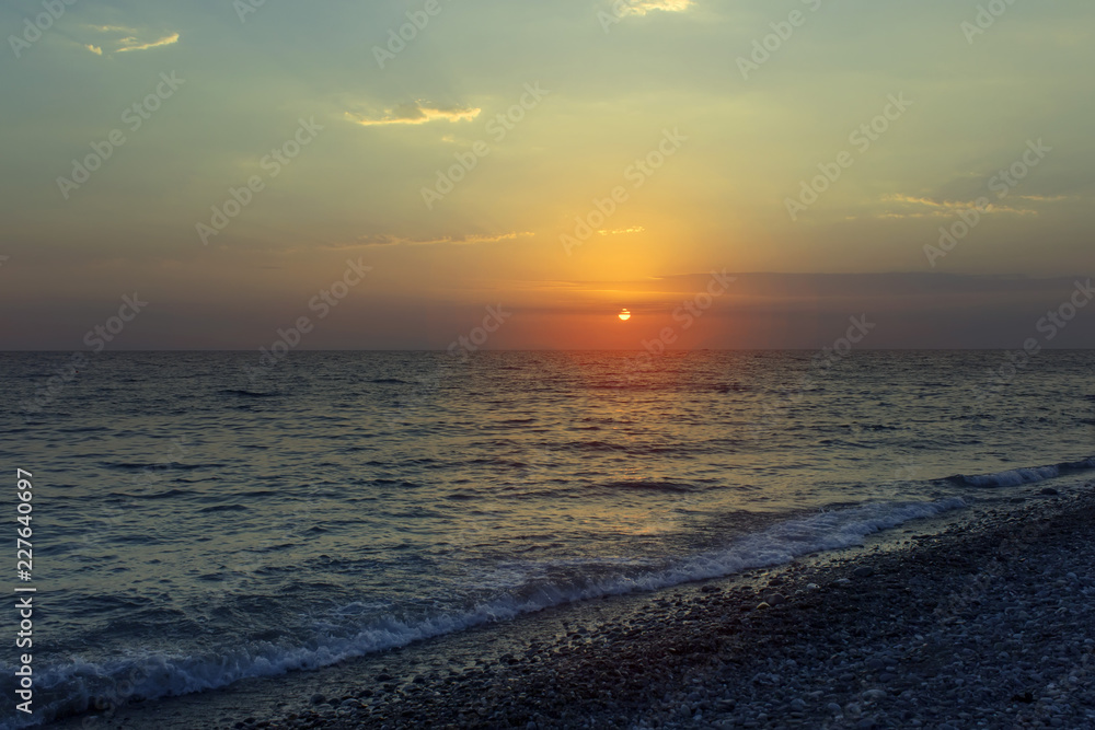 Beautiful sunset on the sea. Summer background.