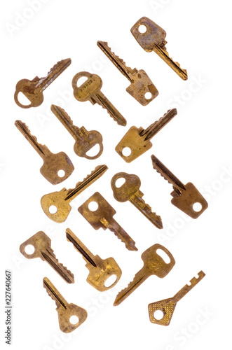 Old vintage keys isolated on white background. Several types of old retro keys. Set of old keys. Composition of different keys.