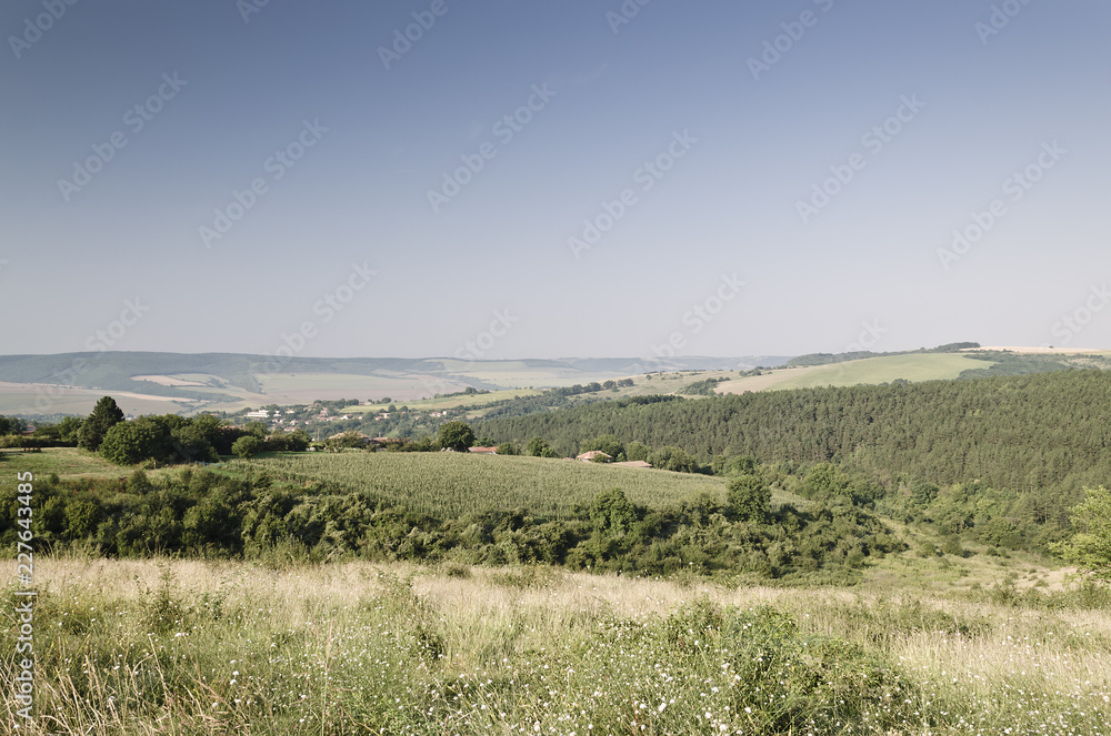 Sunny Blue Sky, Meadow and a hills near the village Katselovo