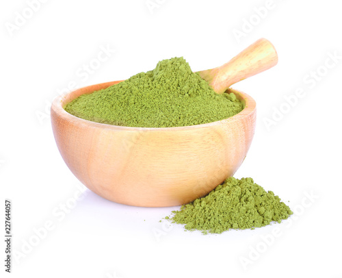 matcha green tea powder in bowl on white background
