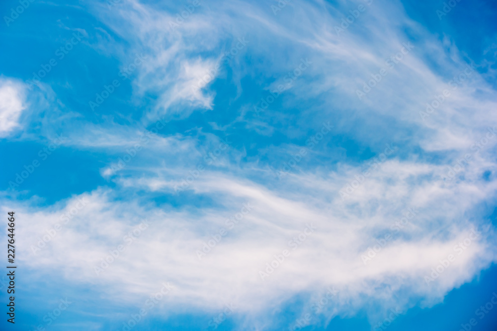 Obraz premium Blue sky with fluffy clouds background.