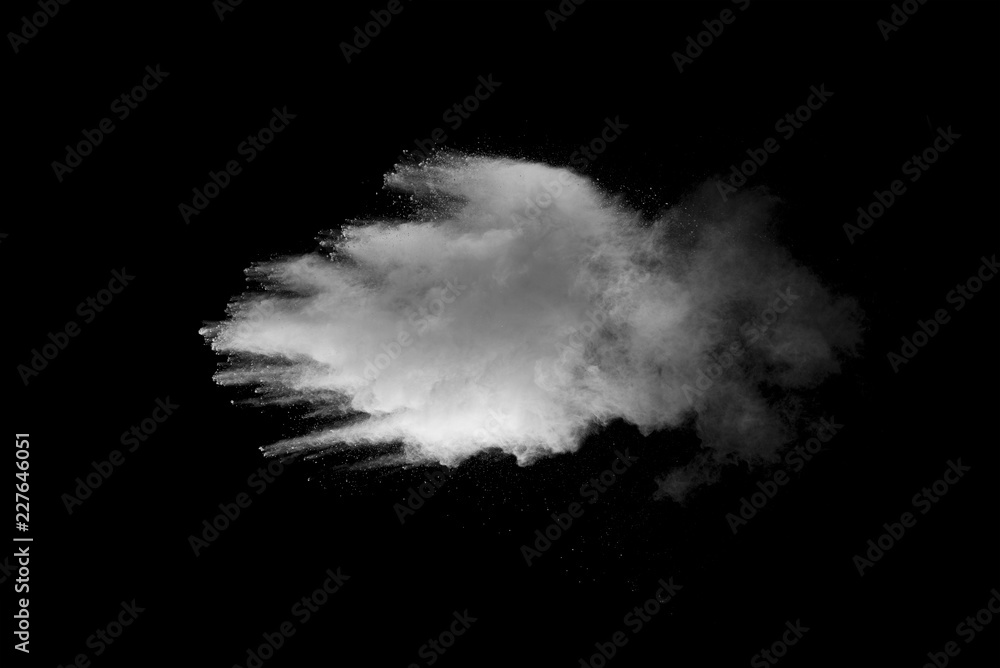 Explosion of white dust on black background. Explosion of white dust on black background.