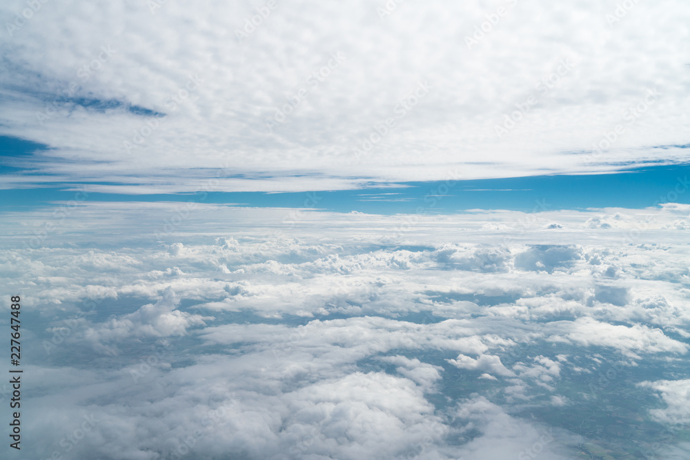 beautiful blue sky with cloud. Blue sky with clouds for background. Skyline View above the Clouds from air plane