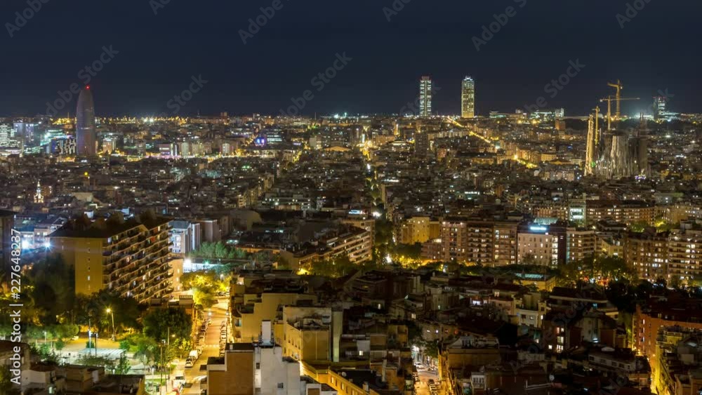 Barcelona city skyline. Panoramic view. Day to night time lapse video. City lights switch on. Barcelona city skyline. Panoramic view. Day to night time lapse video. City lights switch on.