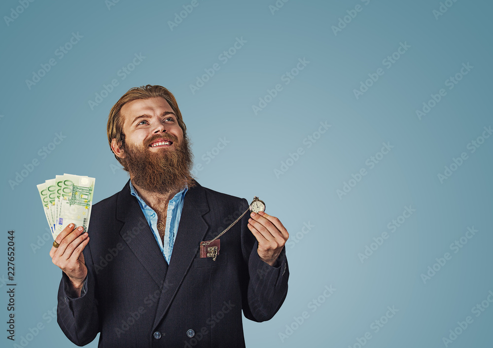 man pumping fists holding money and pocket watch man pumping fists holding money and pocket watch