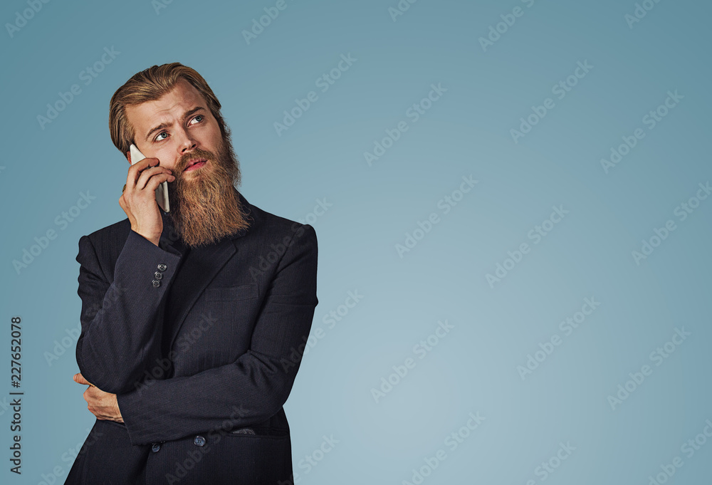 man holding looking up talking speaking on phone thinking man holding looking up talking speaking on phone thinking