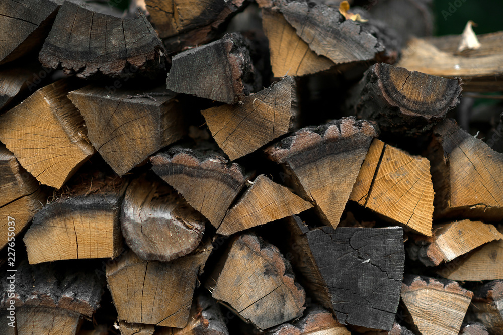 logs wooden log houses neatly stacked as a background and natural texture logs wooden log houses neatly stacked as a background and natural texture